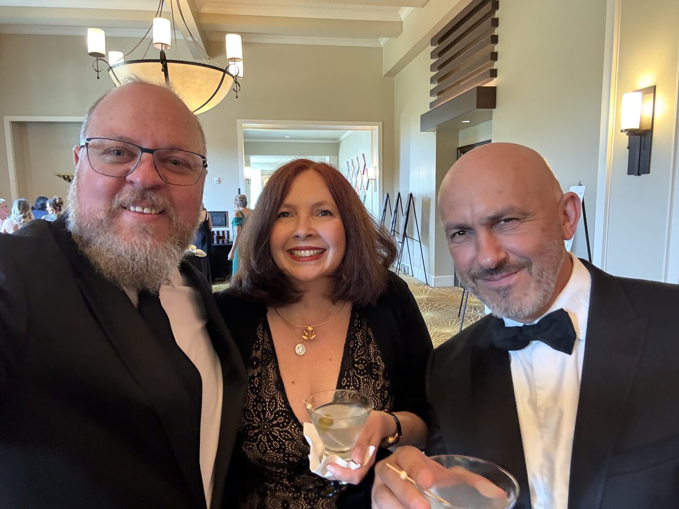 Eduardo G. of Cafe Azul with team members at an evening event